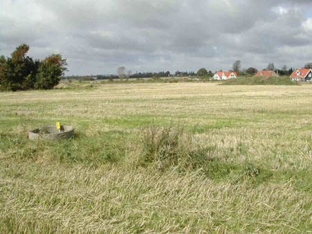 Mod vest fra øst en tredjedel op ad parcel 12